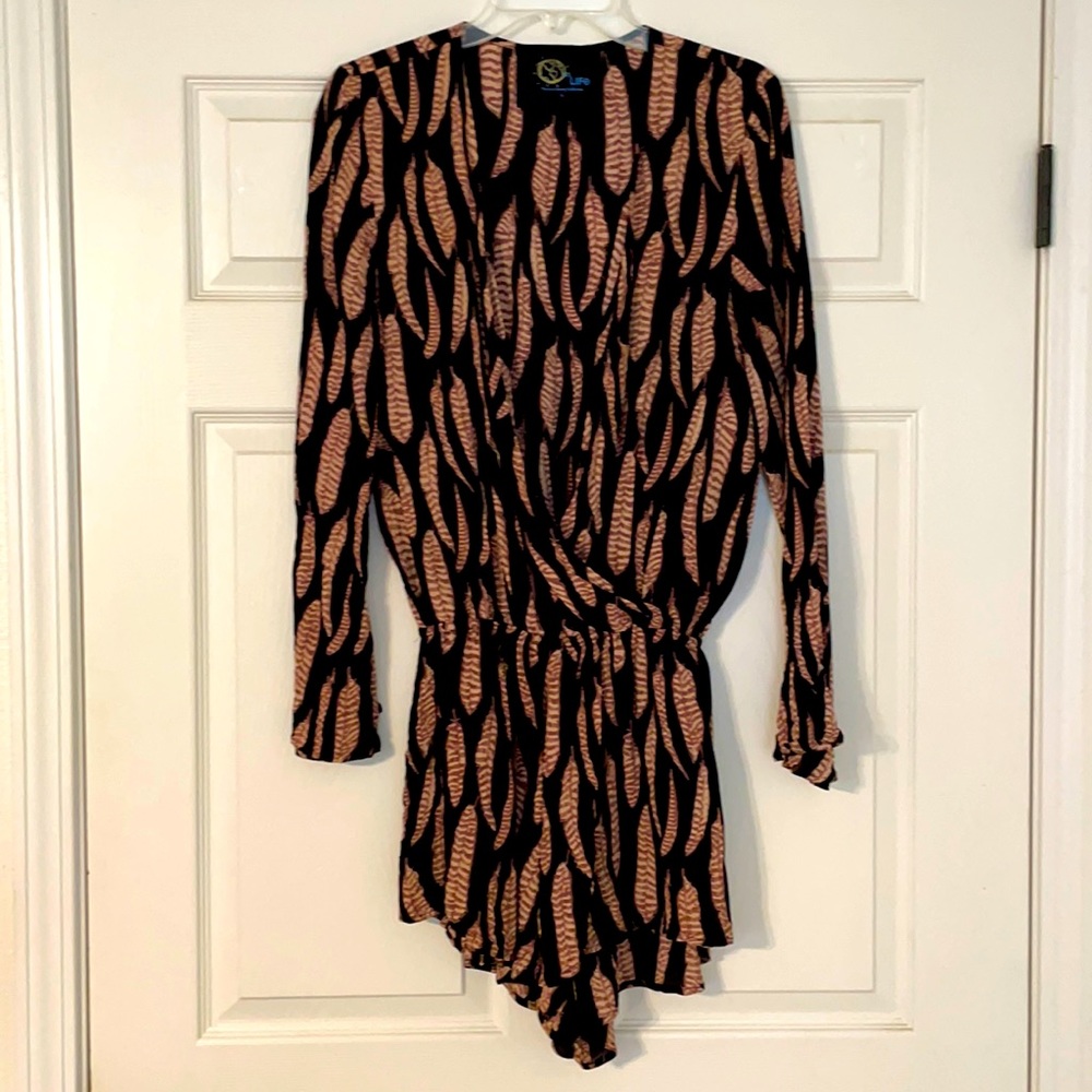Black romper with feather details